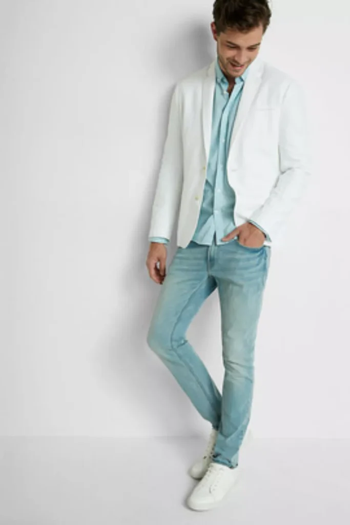 White Blazer + Light Blue Button-Up Shirt + Light Blue Skinny Jeans + White Sneakers