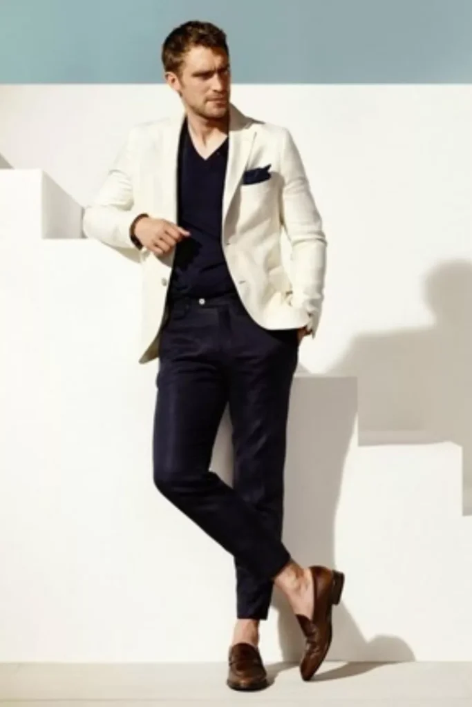 White Blazer + Dark Navy V-neck Shirt + Dark Navy Trousers + Brown Loafers + Pocket Square