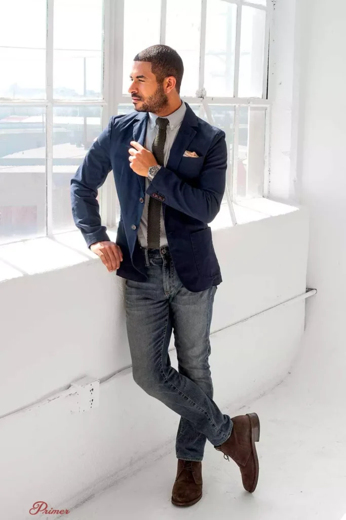 Grey Button-down Shirt + Navy Blue Blazer + Dark Wash Jeans + Brown Suede Chukka Boots