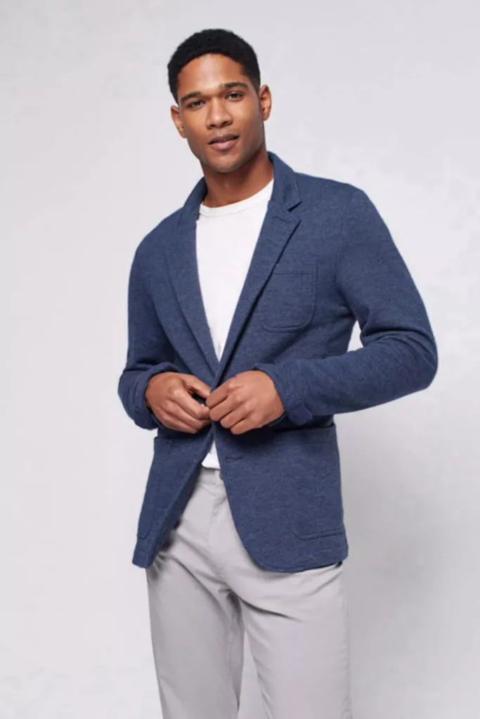 White T-shirt + Navy Blue Knit Blazer + Light Grey Chinos