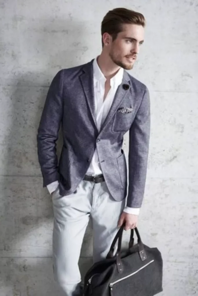 Gray Blazer + White Dress Shirt + Light Gray Chinos + Brown Leather Belt + Black Carryall Bag