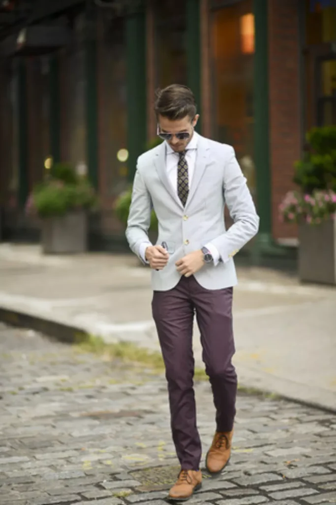 White Blazer + White Dress Shirt + Patterned Tie + Burgundy Chinos + Brown Leather Shoes